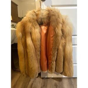 Vintage real fox fur coat from Olga Furs in New York size small with pockets